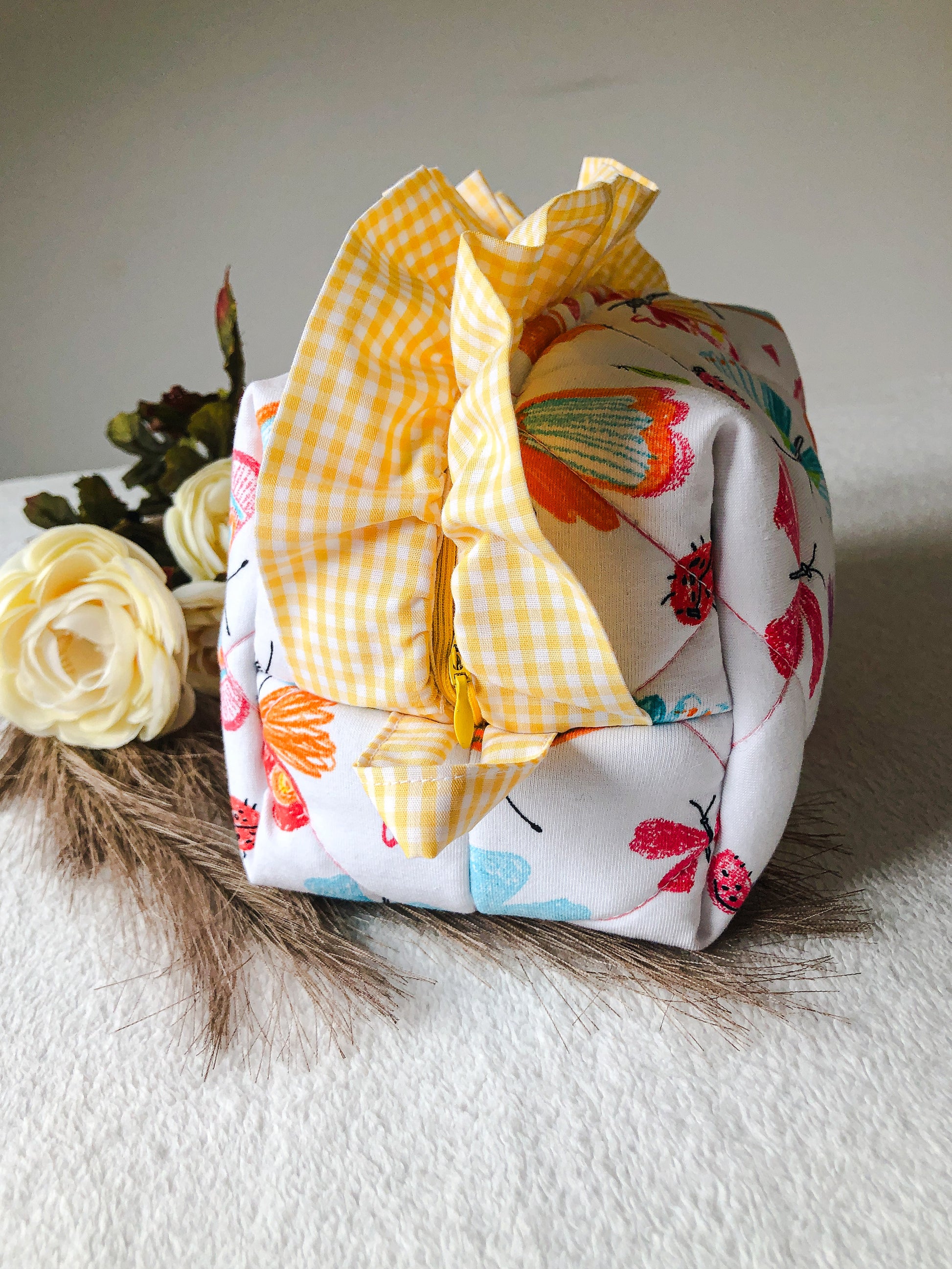 Quilted Ruffle Makeup Bag. Side View